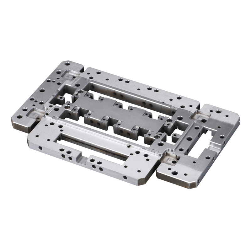 Machined stainless steel fixture components with precision holes and locating surfaces